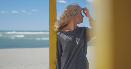 Image showing Young woman enjoying the warm autumn day