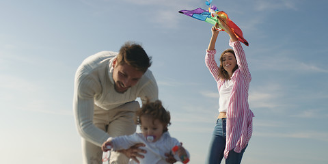 Image showing Young family enjoying vecation during autumn