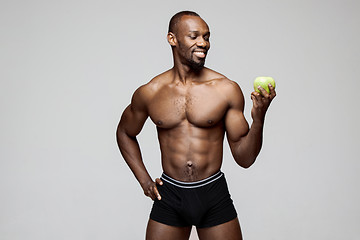 Image showing Fit young man with beautiful torso isolated on white background