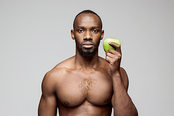 Image showing Fit young man with beautiful torso isolated on white background