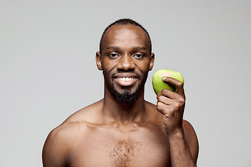 Image showing Fit young man with beautiful torso isolated on white background