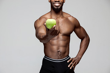 Image showing Fit young man with beautiful torso isolated on white background