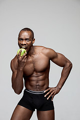 Image showing Fit young man with beautiful torso isolated on white background