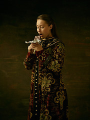 Image showing Girl standing in Russian traditional costume.