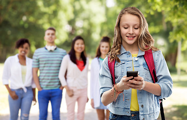 Image showing teen student girl with school bag and smartphone