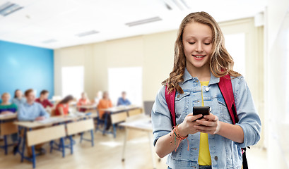 Image showing teen student girl with school bag and smartphone