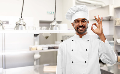 Image showing indian chef showing ok sign at restaurant kitchen