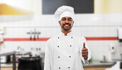 Image showing indian chef shows thumbs up at restaurant kitchen