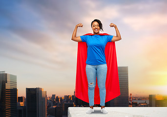 Image showing happy african american woman in superhero red cape