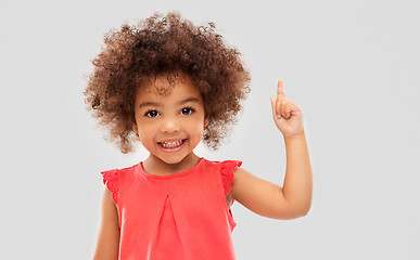 Image showing little african american girl pointing finger up