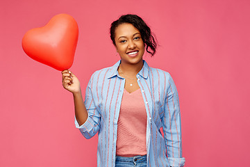 Image showing african american woman with heart-shaped balloon