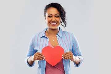 Image showing happy african american woman with red heart