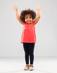 Image showing happy little african american girl with hands up