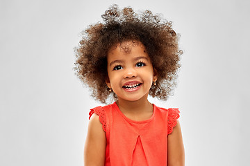 Image showing happy little african american girl over grey