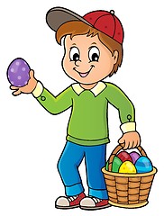 Image showing Boy with Easter eggs theme image 1