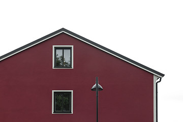 Image showing Streetlight in front of modern red house