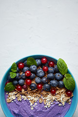 Image showing Healthy food concept. Fresh fruit Blackberries and currants yogu