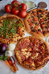 Image showing Thick american style homemade on fluffy dough pizzas