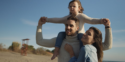 Image showing Young family enjoying vecation during autumn