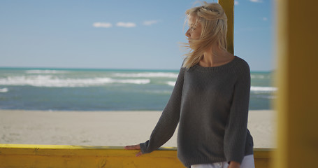 Image showing Young woman enjoying the warm autumn day