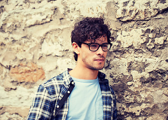 Image showing man in eyeglasses on city street