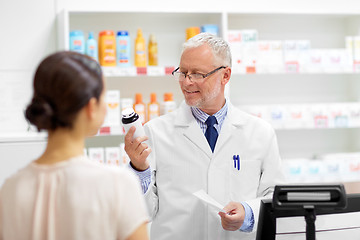 Image showing apothecary with cure and customer at pharmacy