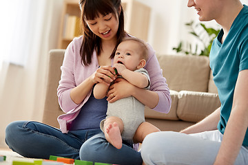 Image showing happy family with baby boy playing at home