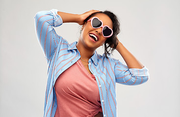 Image showing african american woman in heart-shaped sunglasses