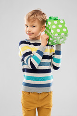 Image showing smiling boy with birthday gift box