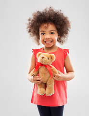 Image showing happy little african american girl with teddy bear