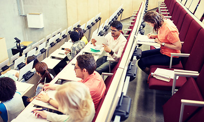 Image showing group of students writing test at lecture hall