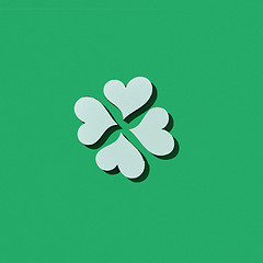 Image showing Handcraft paper white clover\'s four petals with shadows.