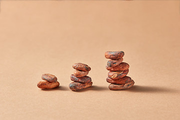 Image showing Three pyramides from natural cocoa beans.