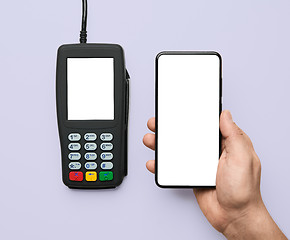 Image showing Contactless payment for paying by smartphone with nfc technology