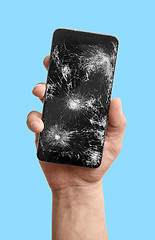 Image showing broken phone in the hand