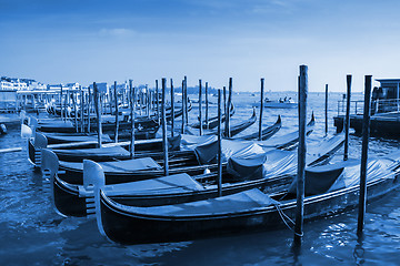 Image showing Gondolas moored in front of Saint Mark square in Venice, Italy. 