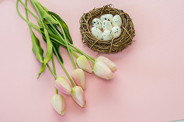 Image showing Easter eggs and tulips on wooden planks
