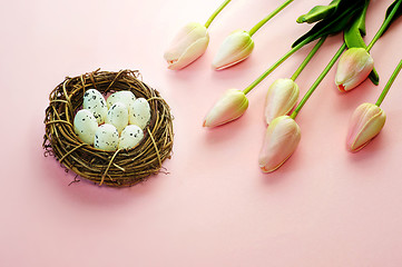 Image showing Easter eggs and tulips on wooden planks