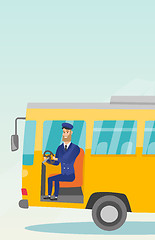 Image showing Caucasian bus driver sitting at steering wheel.