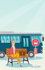 Image showing Caucasian woman waiting for a bus at the bus stop.