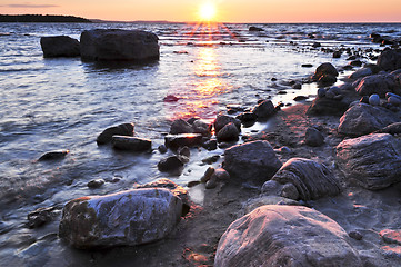 Image showing Sunset over water