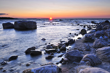 Image showing Sunset over water