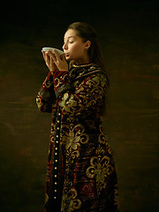 Image showing Girl standing in Russian traditional costume.