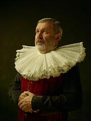 Image showing Official portrait of historical governor from the golden age. Studio shot against dark wall.