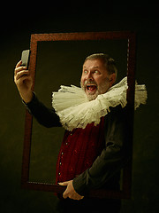 Image showing Official portrait of historical governor from the golden age. Studio shot against dark wall.