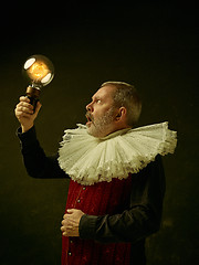 Image showing Official portrait of historical governor from the golden age. Studio shot against dark wall.