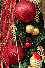 Image showing Beautiful Christmas decoration with balls and ribbons