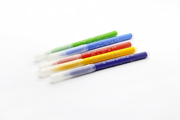 Image showing Multicolored markers on white background