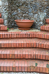 Image showing Bricks Stairs and Pot