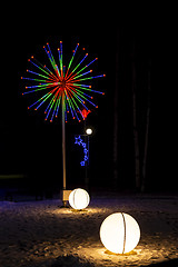 Image showing Wonderful holiday illuminated figures decorate night city at winter